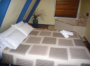 The Aframe queen bed in master bedroom